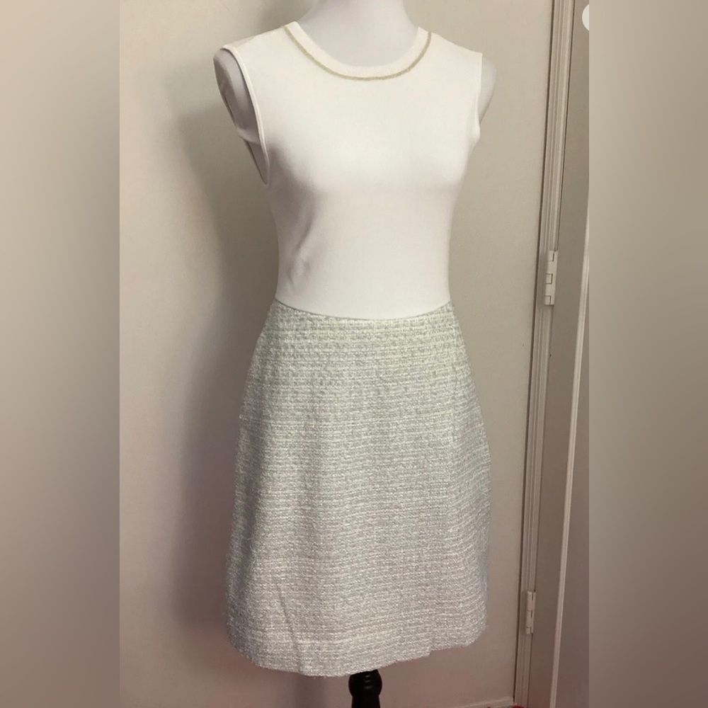 Ted baker of London size 2 really a 6-8 US. Sleeveless dress with gold trim.